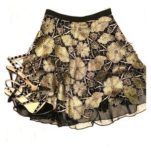 Anthropologie skirt with gold metallic overlay
